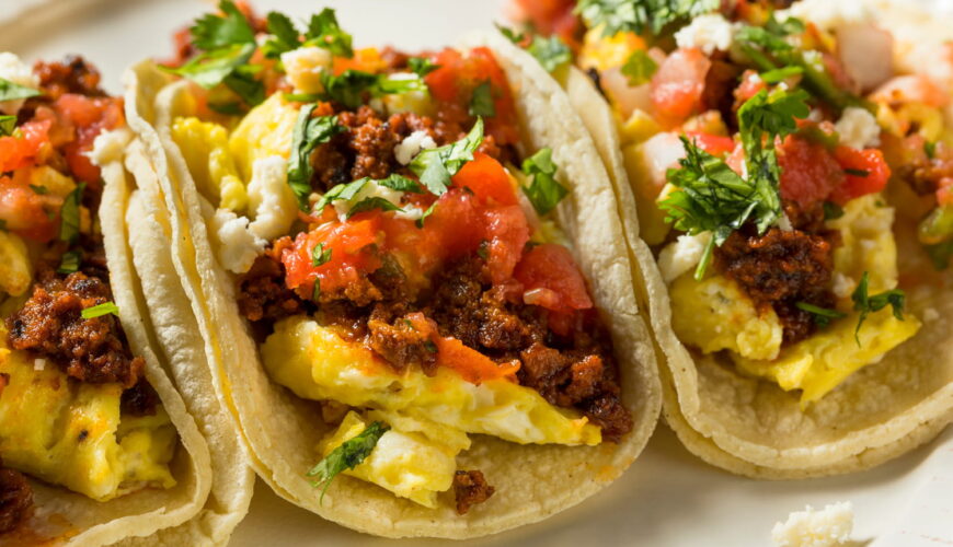 beef chorizo breakfast tacos with eggs, salsa, cilantro, and cheese